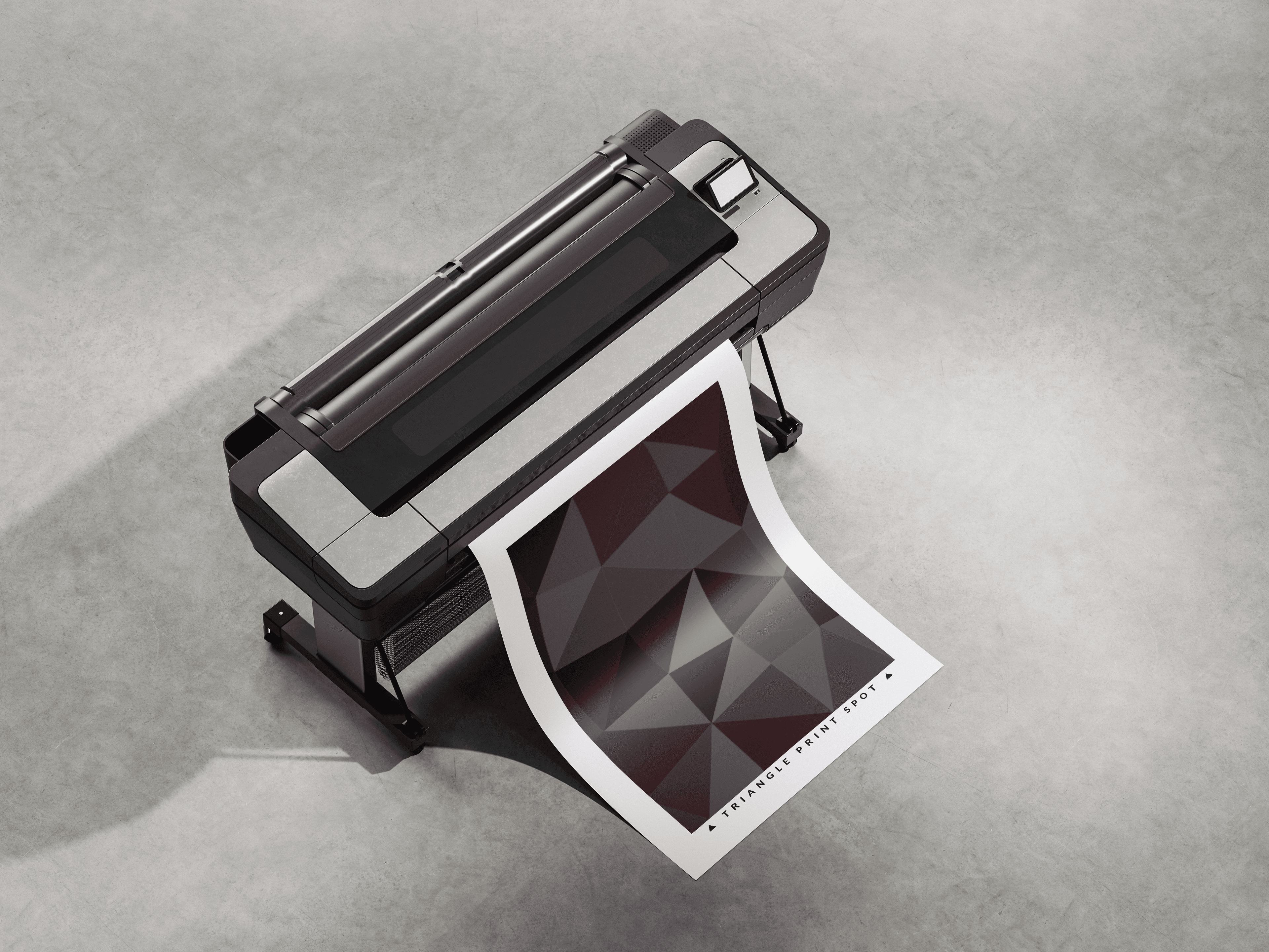 A printer generating a poster, prominently displayed with a grey background.